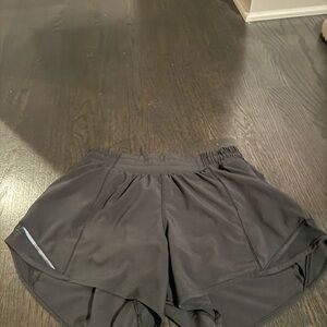 black lululemon hottie hot shorts 4 inch size 6